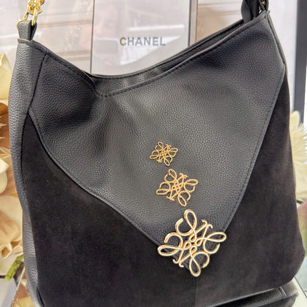 Laura Biaggi – elegancka torebka z ozdobnym złotym detalem