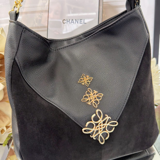 Laura Biaggi – elegancka torebka z ozdobnym złotym detalem