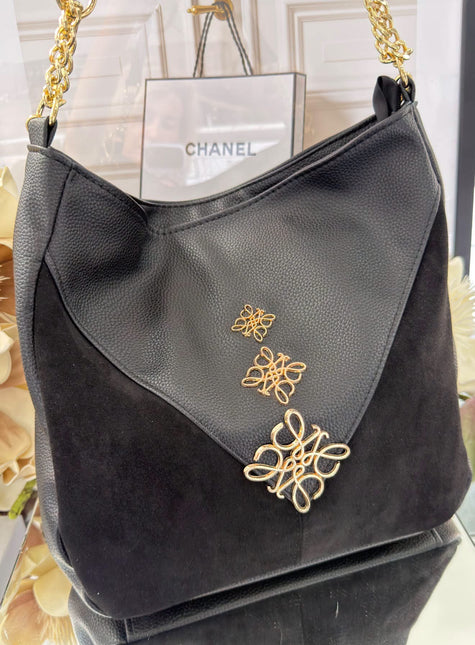 Laura Biaggi – elegancka torebka z ozdobnym złotym detalem