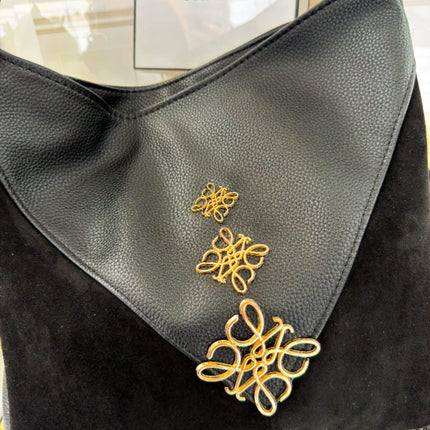 Laura Biaggi – elegancka torebka z ozdobnym złotym detalem