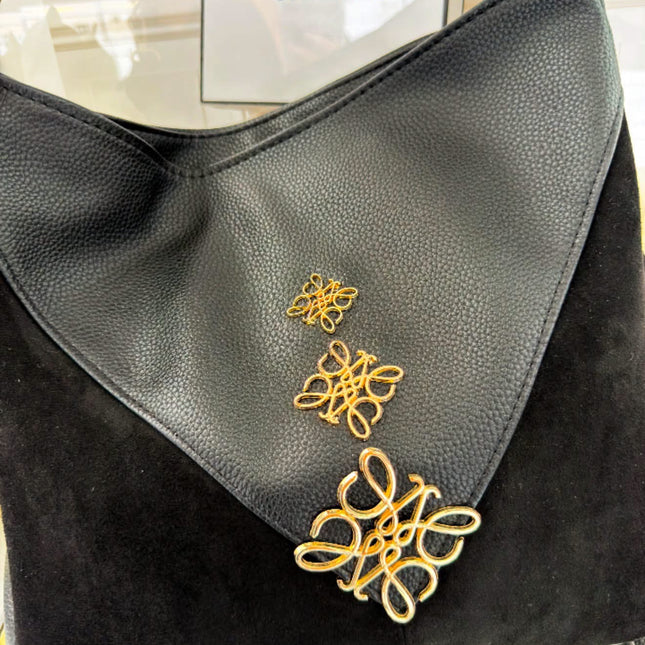 Laura Biaggi – elegancka torebka z ozdobnym złotym detalem
